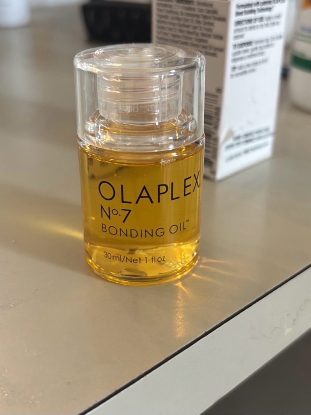 OLAPLEX No.7 Bonding Oil - Clear Bottle with Gold Oil